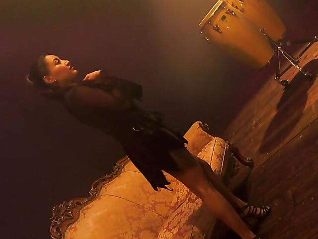 Italian porn by Mario Salieri features a natural busty burlesque queen seducing a guy to music