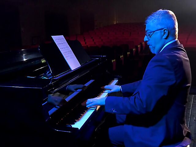 Italian porn by Mario Salieri features a natural busty burlesque queen seducing a guy to music