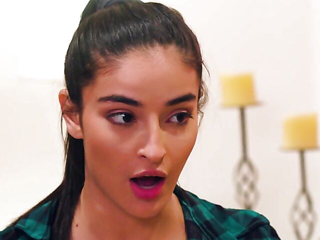 Young lesbian Emily Willis and her exotic friend Ember Snow do it on the couch