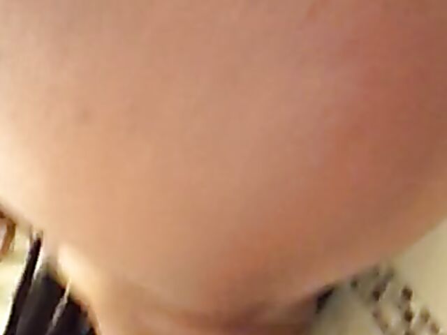 Shaved amateur ebony pissing in the bathroom