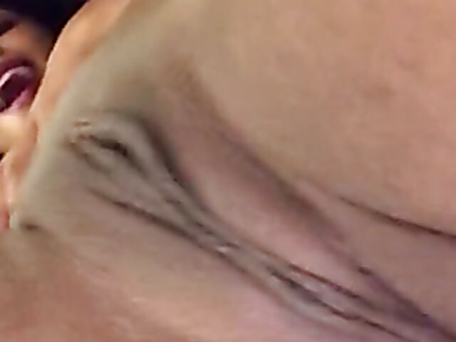 Shaved amateur ebony pissing in the bathroom