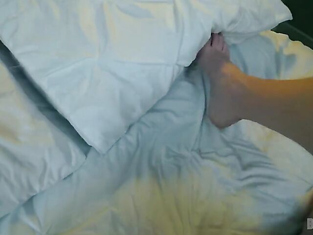 Busty brunette dressed in red Bryci is horny in her bed