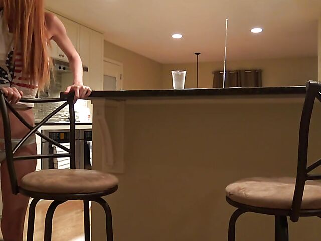 Hot redhead Jenny Blighe caught masturbating in the kitchen