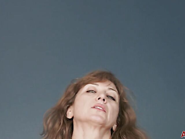 Mature lady in white stockings Rafaella displays her small saggy tits and fingers herself