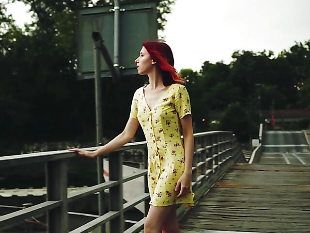 Skinny redhead in heels Elin Flame takes off her dress and shows her snatch outdoors