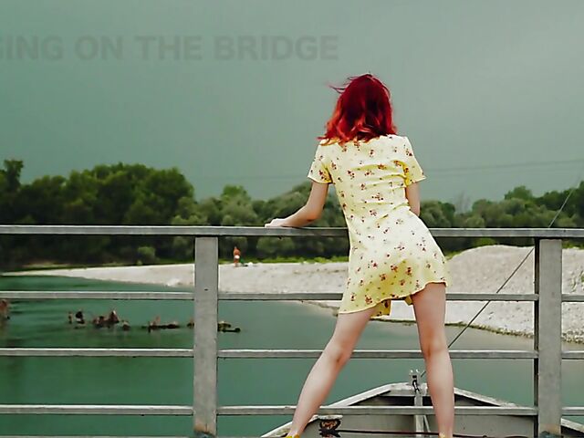 Skinny redhead in heels Elin Flame takes off her dress and shows her snatch outdoors