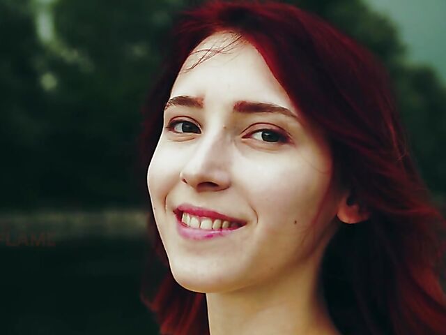 Skinny redhead in heels Elin Flame takes off her dress and shows her snatch outdoors