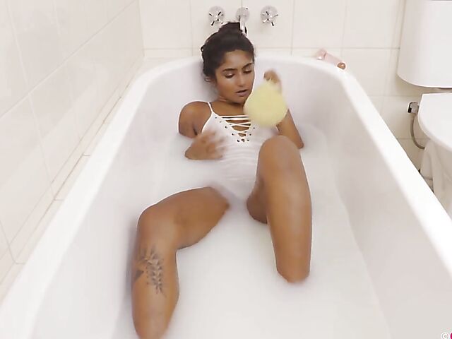 Rhea - Milk bath with a cute indian masturbating passionately