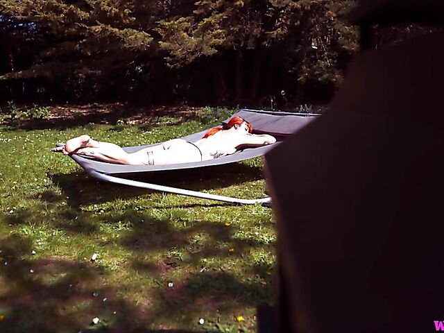 Redhead tattoo girl with tiny boobs Auburn Fox gets caught topless in the garden and shows her twat 