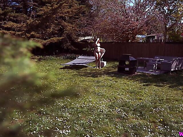 Redhead tattoo girl with tiny boobs Auburn Fox gets caught topless in the garden and shows her twat 