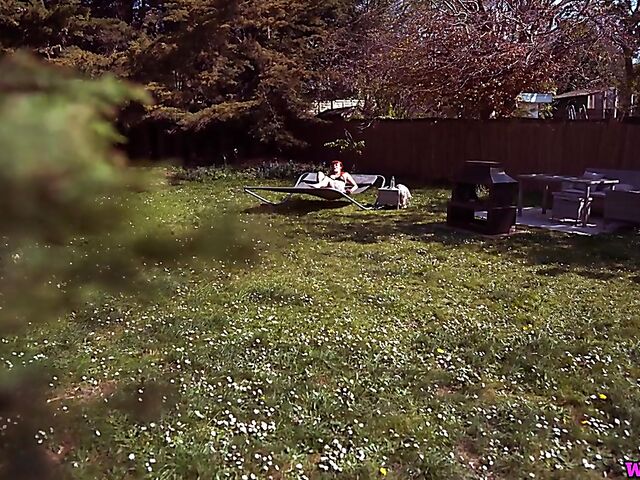 Redhead tattoo girl with tiny boobs Auburn Fox gets caught topless in the garden and shows her twat 