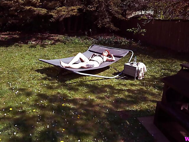 Redhead tattoo girl with tiny boobs Auburn Fox gets caught topless in the garden and shows her twat 
