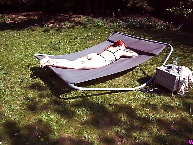 Redhead tattoo girl with tiny boobs Auburn Fox gets caught topless in the garden and shows her twat 