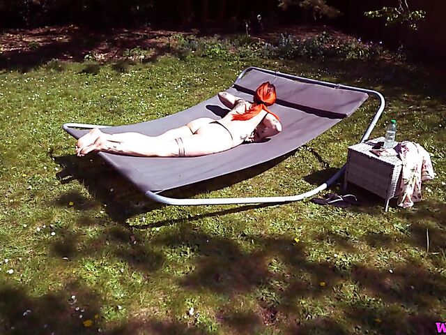 Redhead tattoo girl with tiny boobs Auburn Fox gets caught topless in the garden and shows her twat 