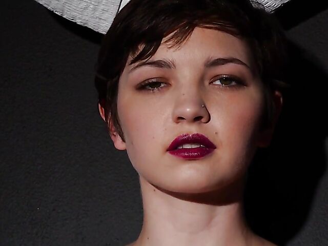 Short hair brunette Jay Marie loves showing off her natural titties and bald pussy