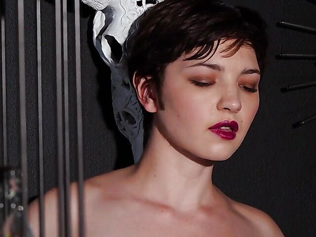 Short hair brunette Jay Marie loves showing off her natural titties and bald pussy