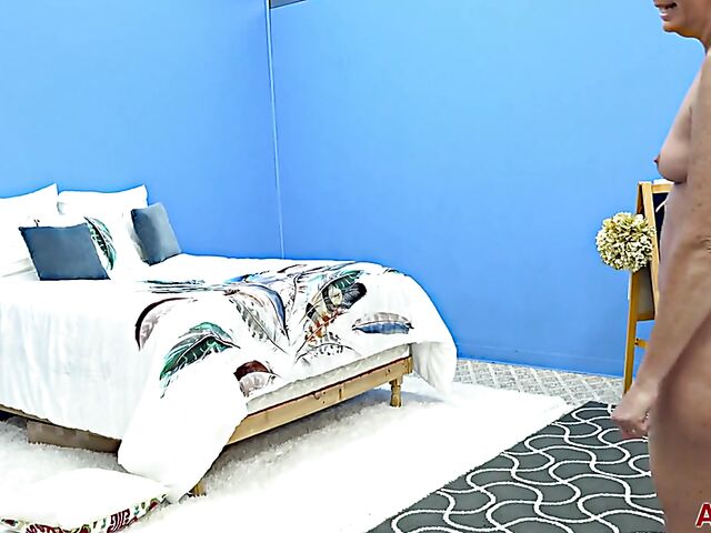 Short haired mature lady Beth Mckenna solo behind the scenes