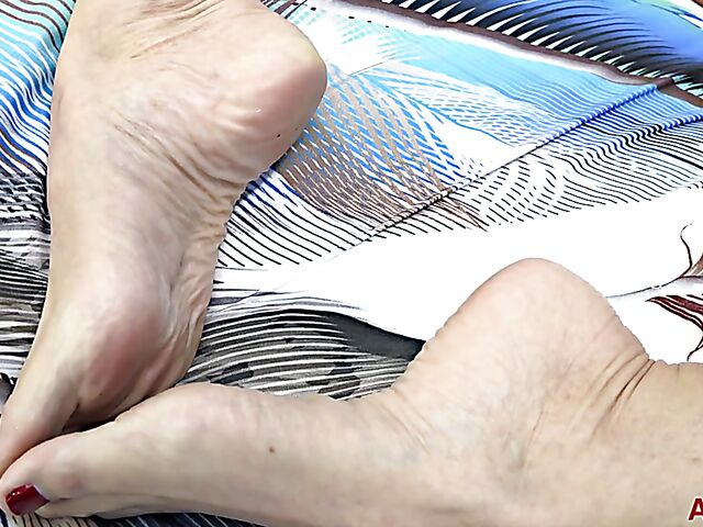 Short haired mature lady Beth Mckenna solo behind the scenes