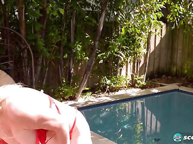 Mature dildo lover Daylynn Thomas fucks her pierced pussy with her big brown toy