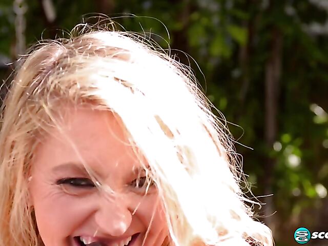 Mature dildo lover Daylynn Thomas fucks her pierced pussy with her big brown toy