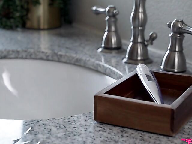 Petite blonde Winter Bell collecting cum with her pussy