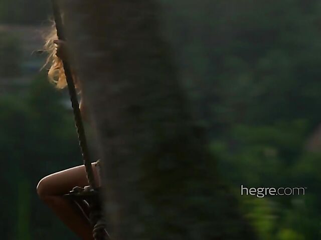 Nude art shoot backstage with Clover swinging outdoors in Bali