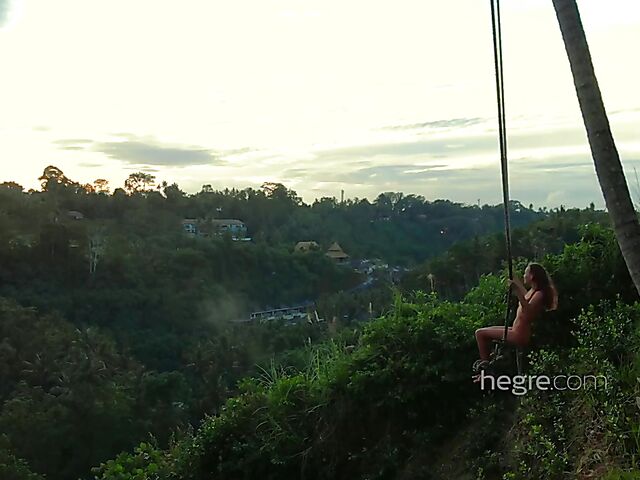 Nude art shoot backstage with Clover swinging outdoors in Bali