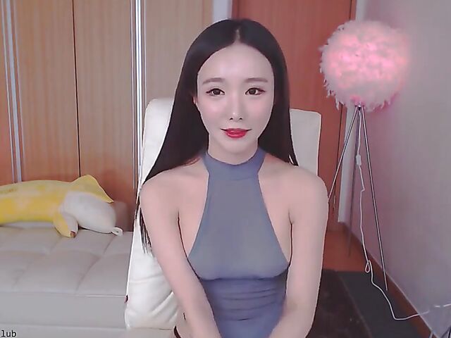 Chinese webcam beauty shows her firm boobs and rubs her mound in her black panties