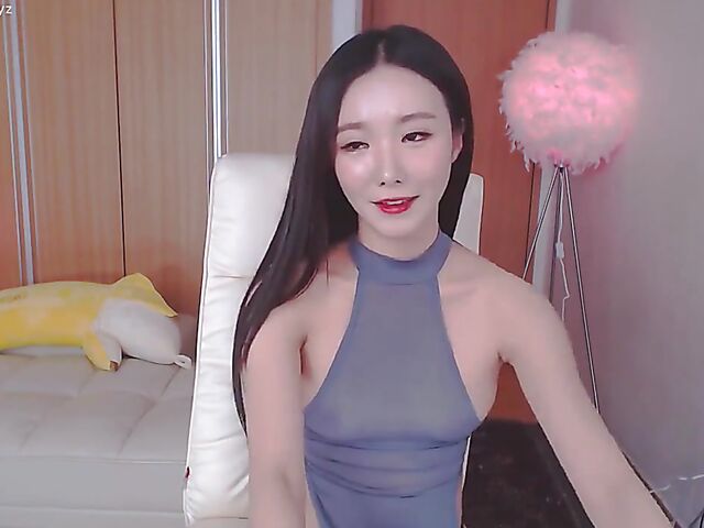 Chinese webcam beauty shows her firm boobs and rubs her mound in her black panties