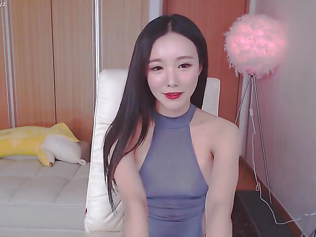 Chinese webcam beauty shows her firm boobs and rubs her mound in her black panties