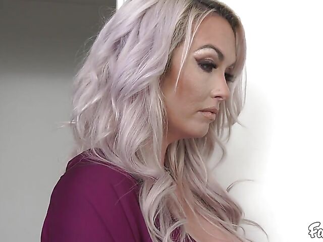 Sexy MILF in black stockings Brook Page helps a guy