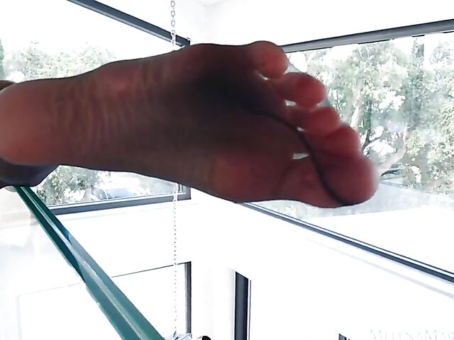 Sexy pantyhose solo with Melena Maria Rya showing off her nyloned feet and pussy