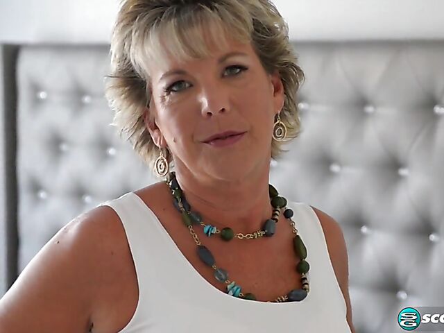 Constance - Mature masturbating in her high boots