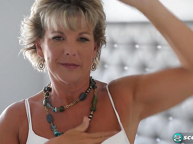 Constance - Mature masturbating in her high boots