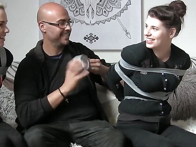 Non nude tape bondage with two pretty girls