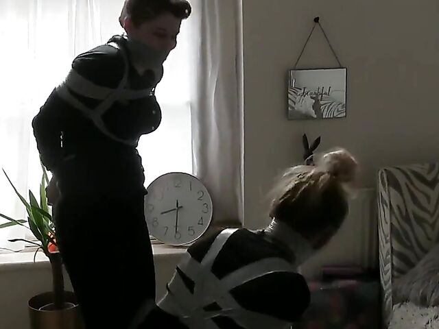 Non nude tape bondage with two pretty girls