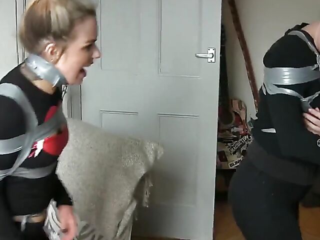 Non nude tape bondage with two pretty girls