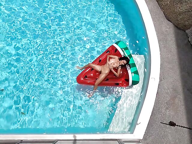 Beautiful Thai babe Kahlisa displays her gorgeous tits and hairy snatch outdoors