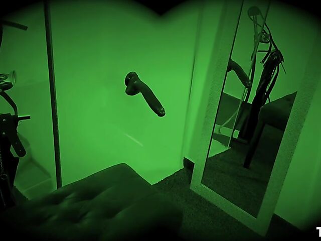 Cindy Shine's black dildo and red ball gag