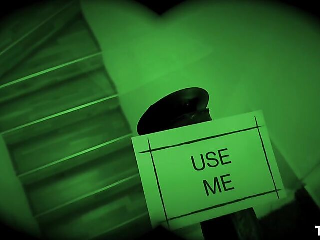 Cindy Shine's black dildo and red ball gag