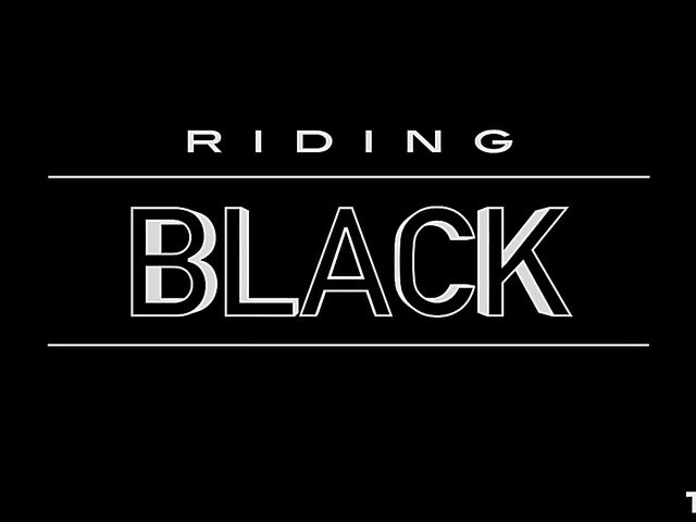 Cindy Shine's black dildo and red ball gag