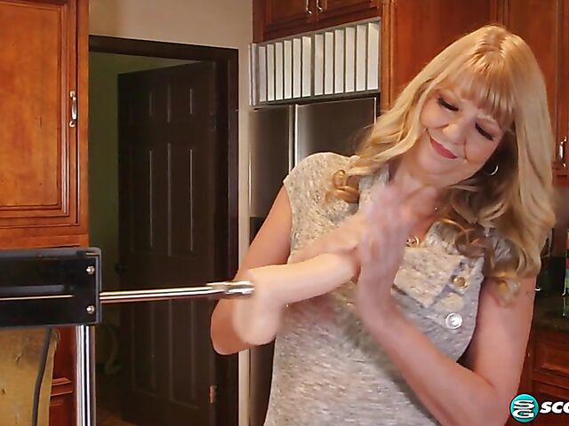 Blonde mature Mia Magnusson loves fucking machines