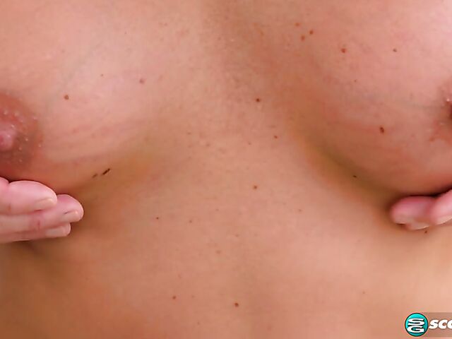 Solo MILF Eliza Kelay showing her fake titties and fingering her hot pussy