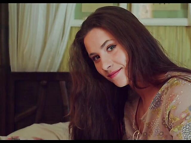 Long-haired beauty with a shaved pussy Mara Blake sewing with no panties and fingering herself