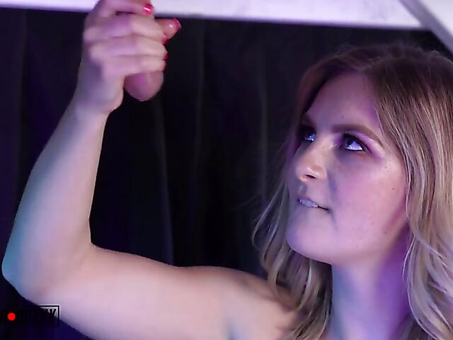 Big tits mistress in latex Kara Lee milking cock under the table