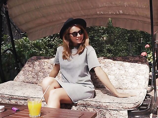 Met Art model with sunglasses Belka stripping and smoking in the garden