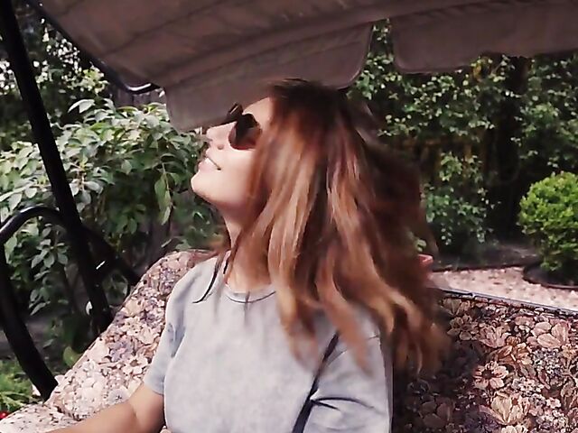 Met Art model with sunglasses Belka stripping and smoking in the garden