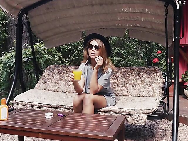 Met Art model with sunglasses Belka stripping and smoking in the garden