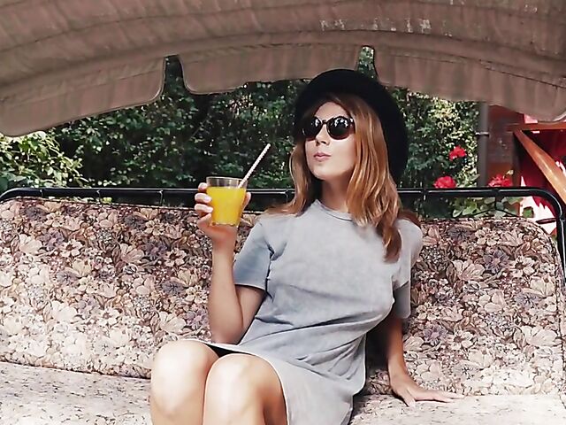 Met Art model with sunglasses Belka stripping and smoking in the garden