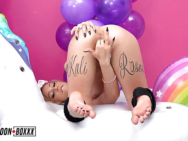 Balloon fetish masturbation on the unicorn with Kali Roses
